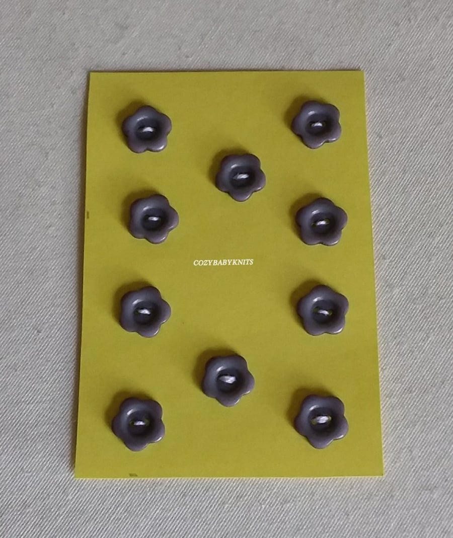 13MM GREY FLOWER BUTTON WITH TWO HOLES FOR ATTACHING 