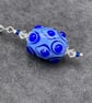 periwinkle and cobalt blue spotted oval lampwork glass pendant necklace