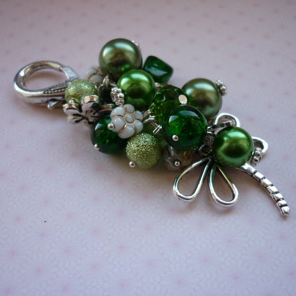 SHADES OF GREEN AND SILVER BAG CHARM.