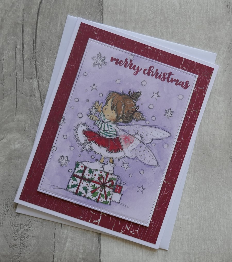 Cute Fairy on Gift with Snowflakes - Christmas Card
