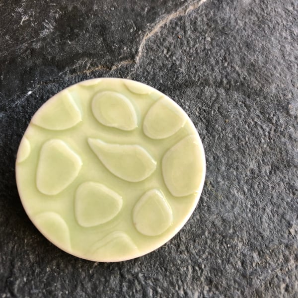 Spotty circles brooch, pale green glaze, white, porcelain, contemporary