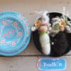 Two  baby bodkin brooches in vintage tin.