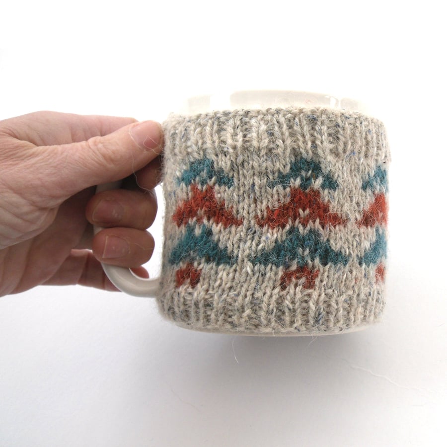 Autumn Mug cosy showing 2 coloured trees , fair isle wool cozy 