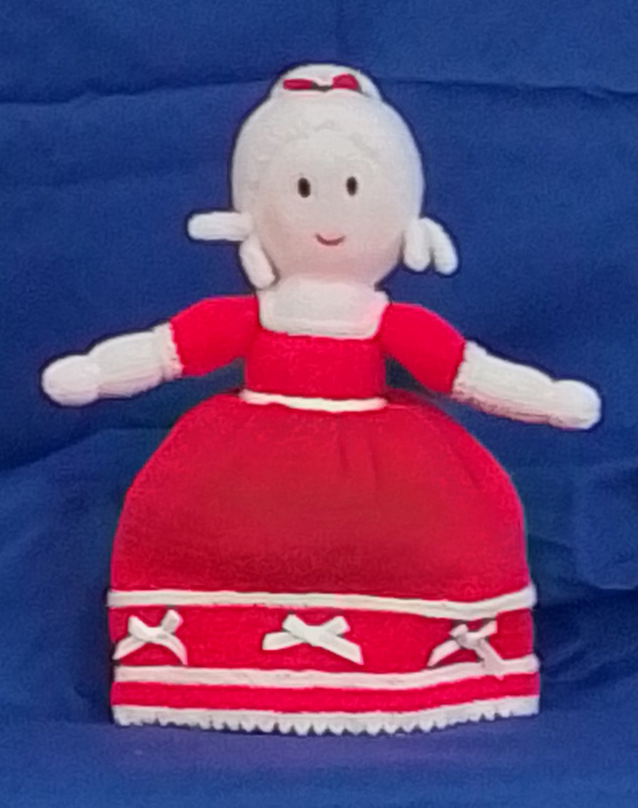 Topsy-turvy hand knitted doll