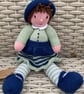 Hand knitted doll