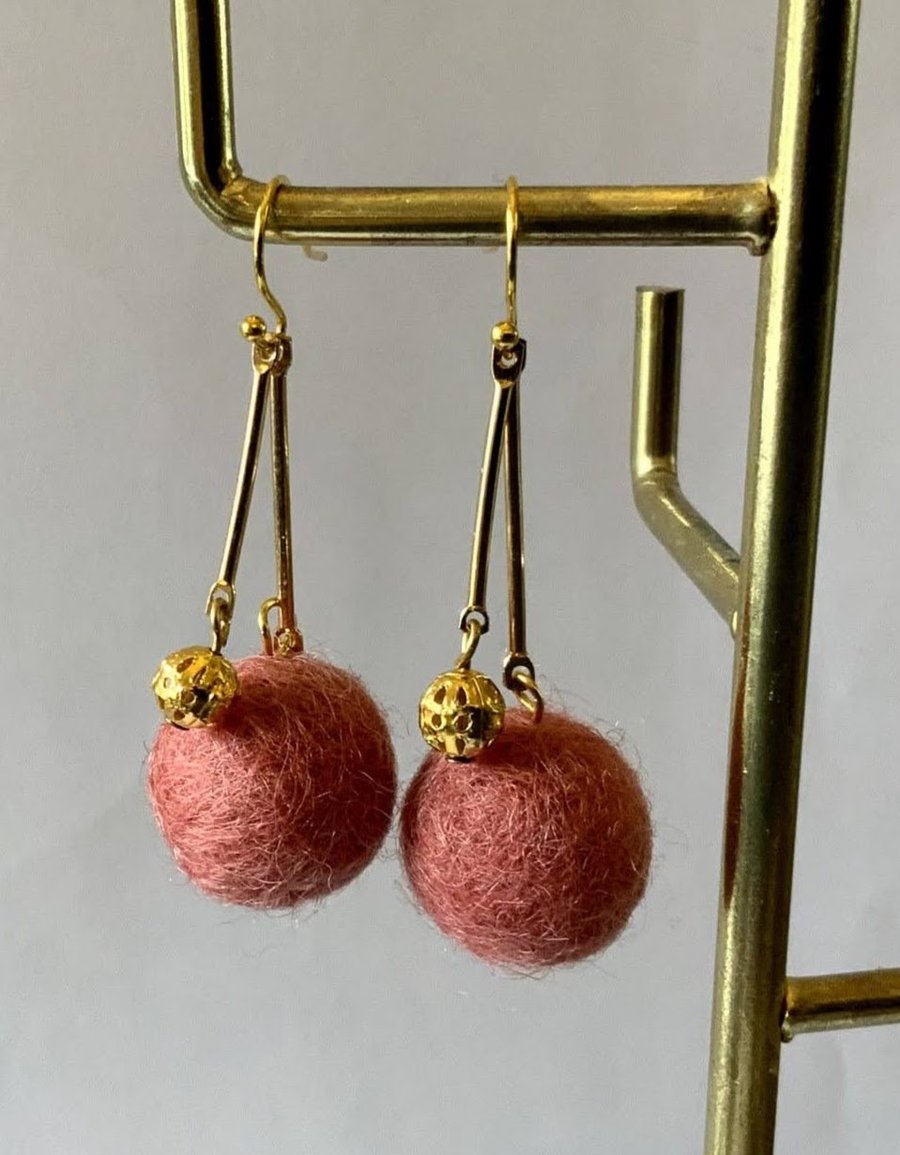 Merino Wool ball earrings with filigree bead.
