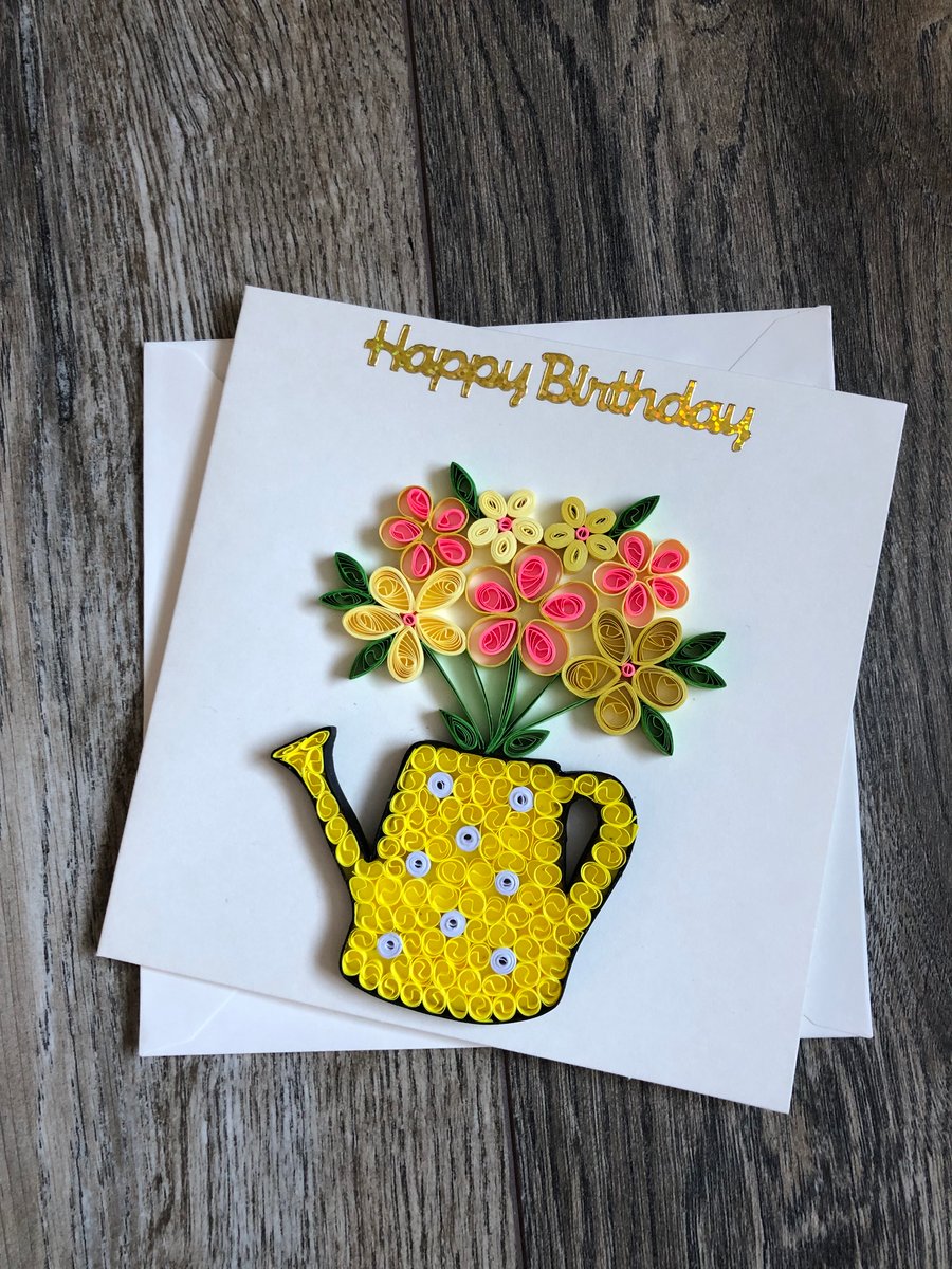 Handmade quilled watering can with flowers 