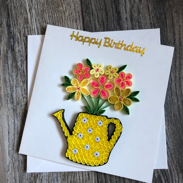 Handmade quilled watering can with flowers 