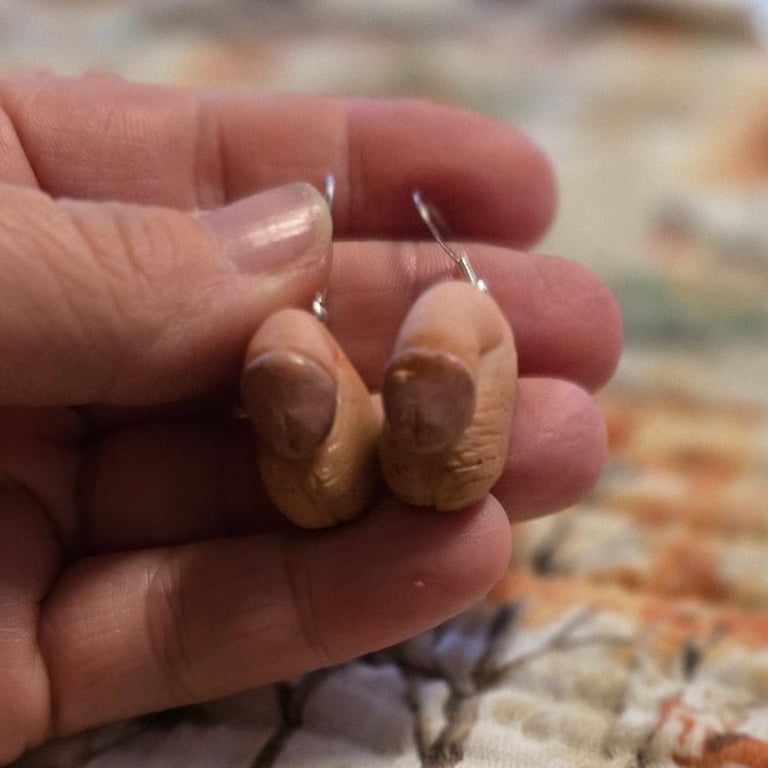 'Serial Killer Trophy' penis and balls earrings