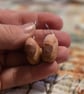 'Serial Killer Trophy' penis and balls earrings