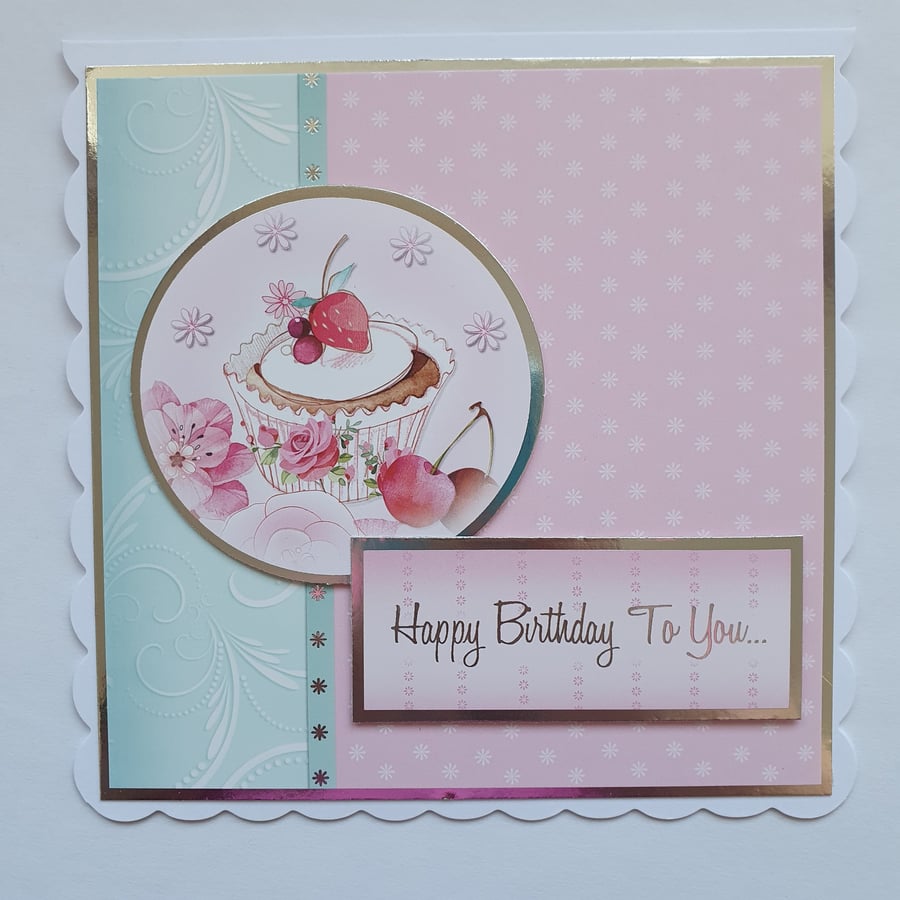 A cupcake foil embossed birthday card