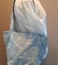Blue tote bag with pockets and magnetic popper fastening.   - Image 10