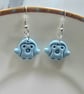 Polymer clay penguin pastel blue earrings on silver plated earhooks