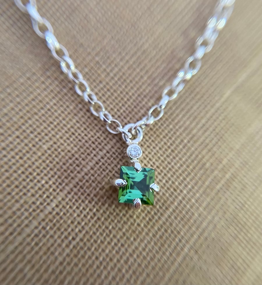 Bright green tourmaline and diamond necklace set in silver 