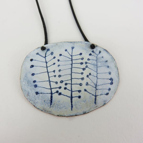 Oval domed hand drawn plant pendant in copper and enamel