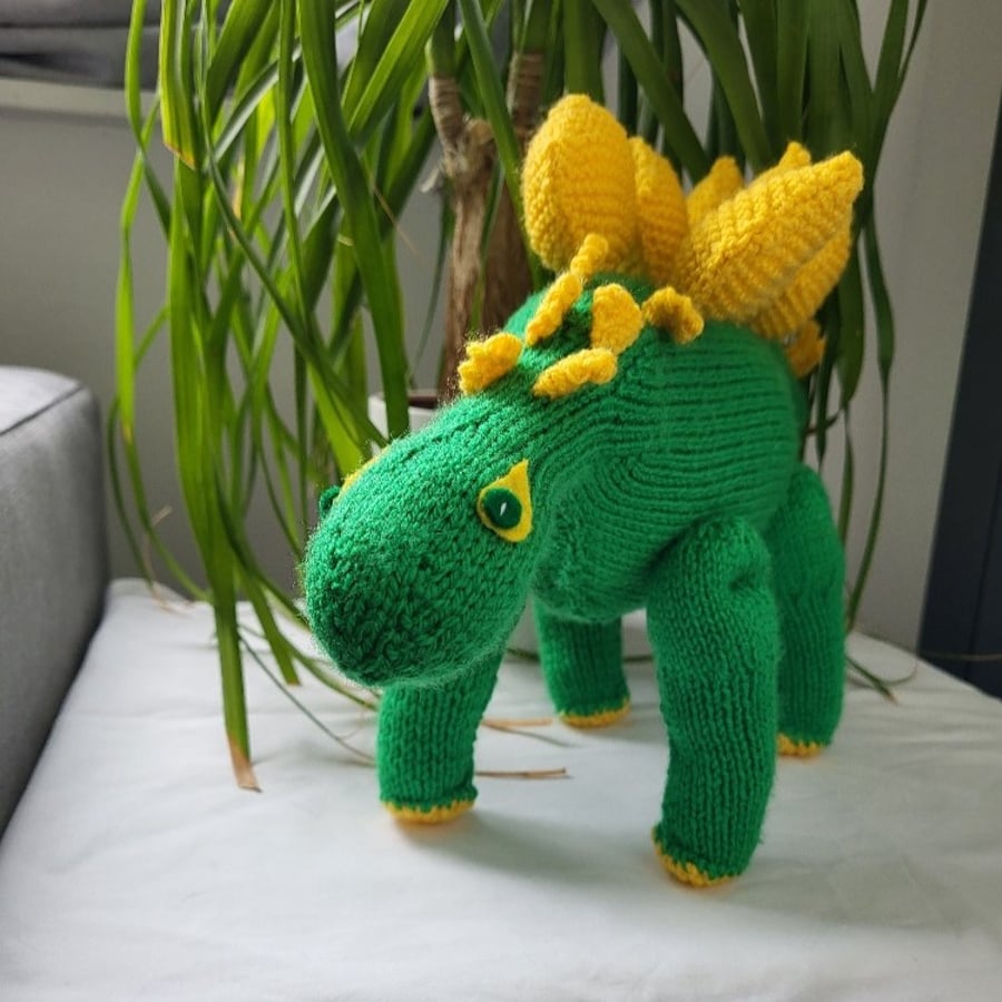Hand knitted Steggy the Dinosaur toy