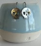 Spooky Silver Skull Earrings for Halloween with a touch of gold - Image 3