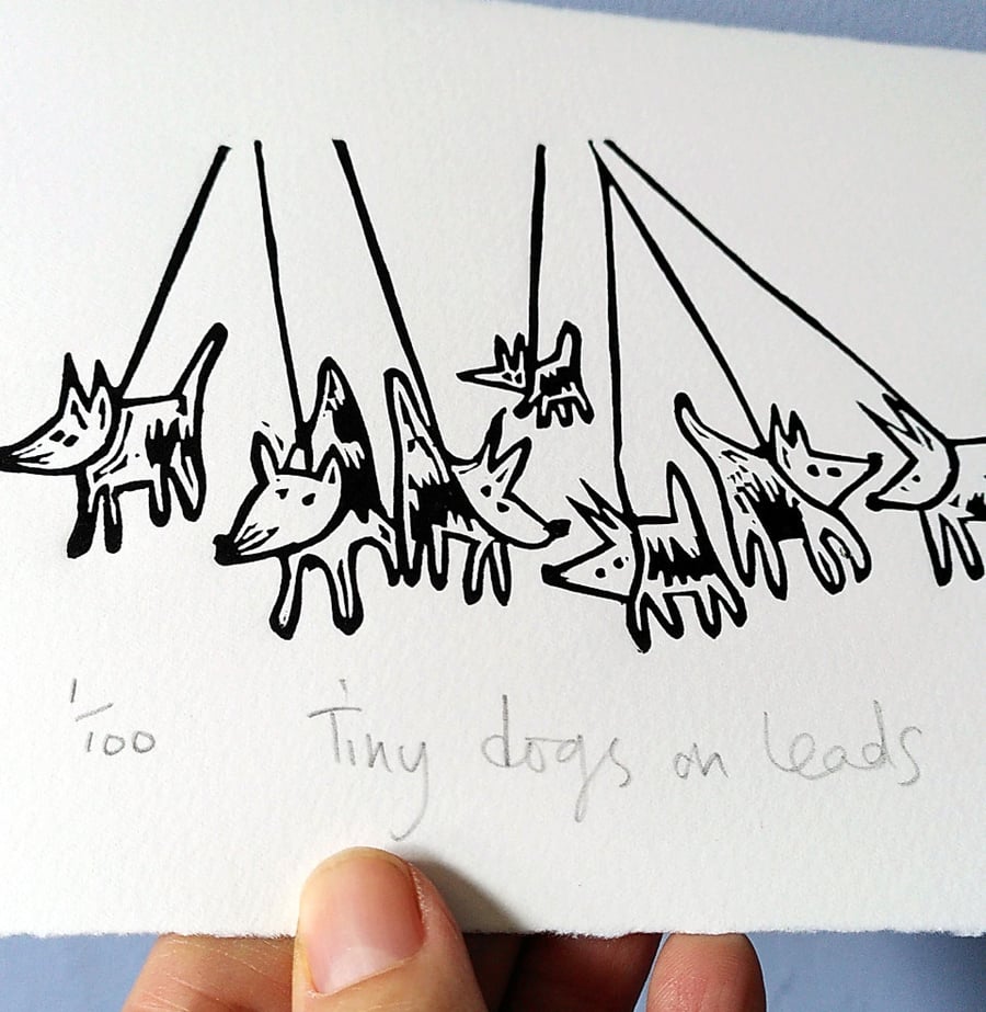 Tiny Dogs on Leads - lino print