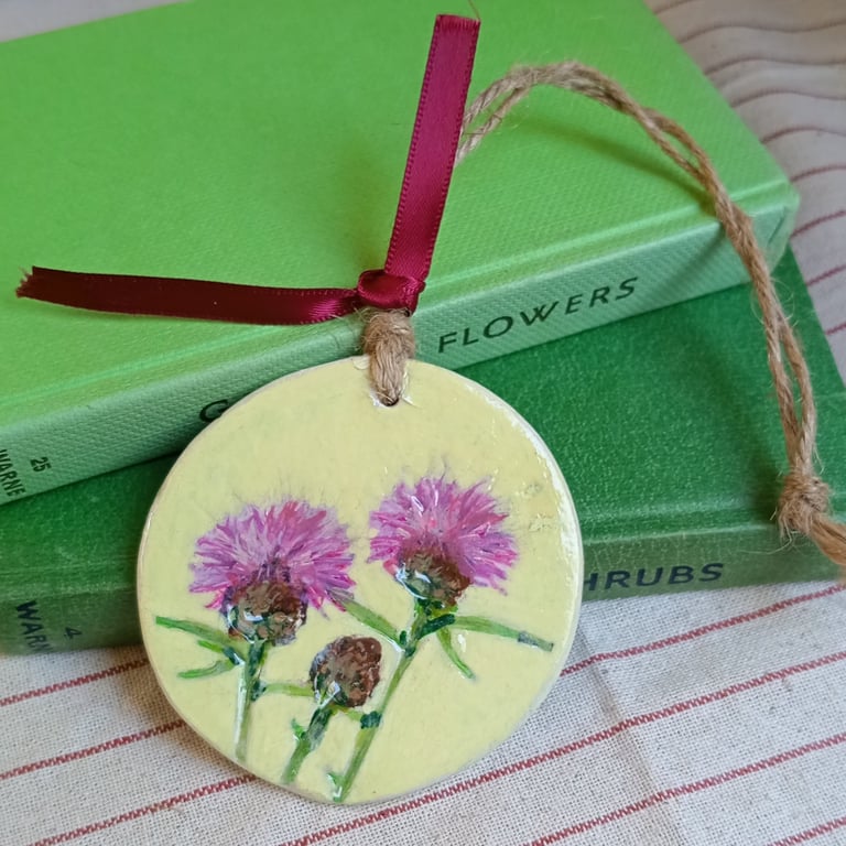 Knapweed clay imprinted and hand painted decoration 