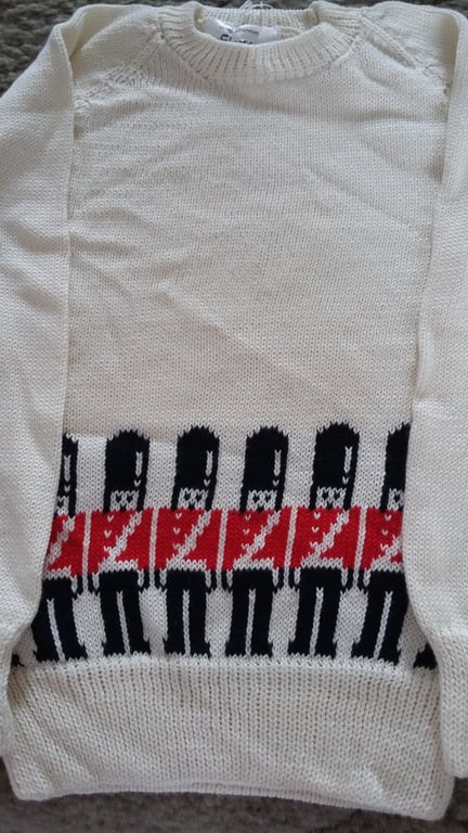 Soldier jumper with guardsmen round the bottom. Machine washable wool or cotton
