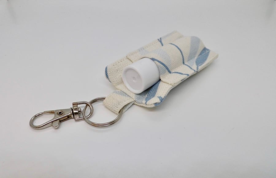 SOLD Key ring lip balm holder in blue Laura Ashley leaf fabric