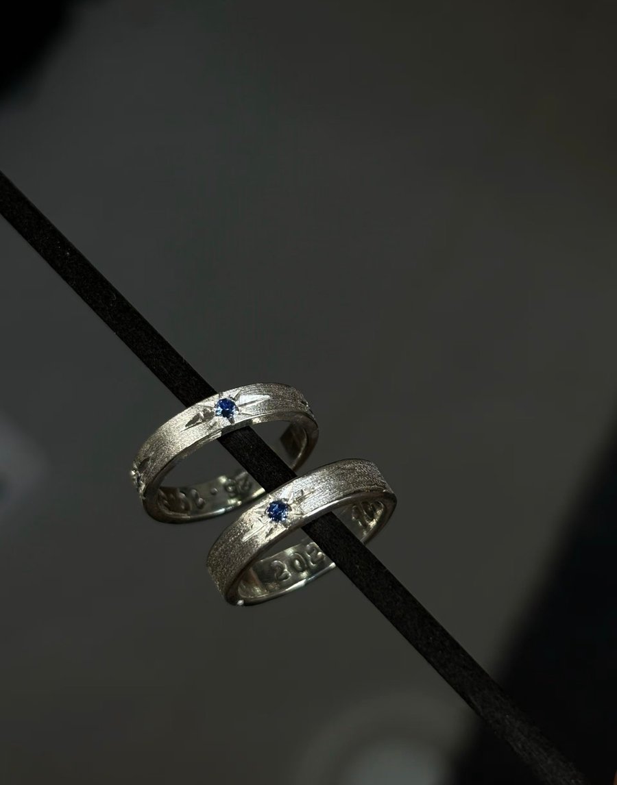 Brush finished 925 sterling silver ring with blue gemstone