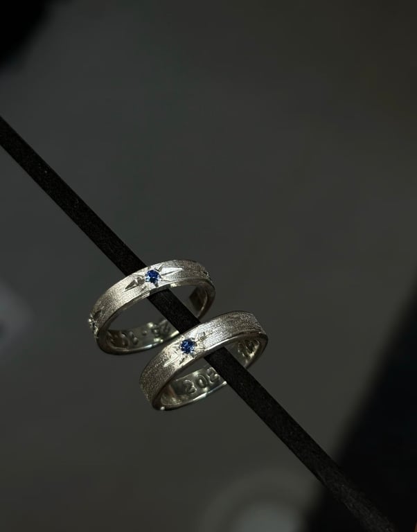Brush finished 925 sterling silver ring with blue gemstone