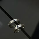 Brush finished 925 sterling silver ring with blue gemstone