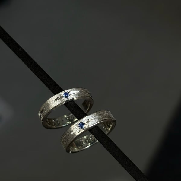 Brush finished 925 sterling silver ring with blue gemstone