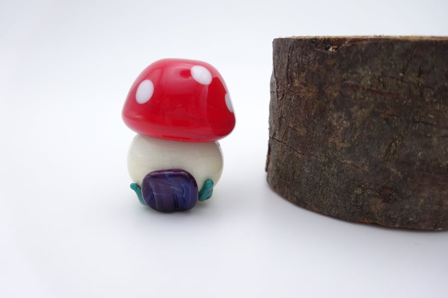 small glass toadstool house