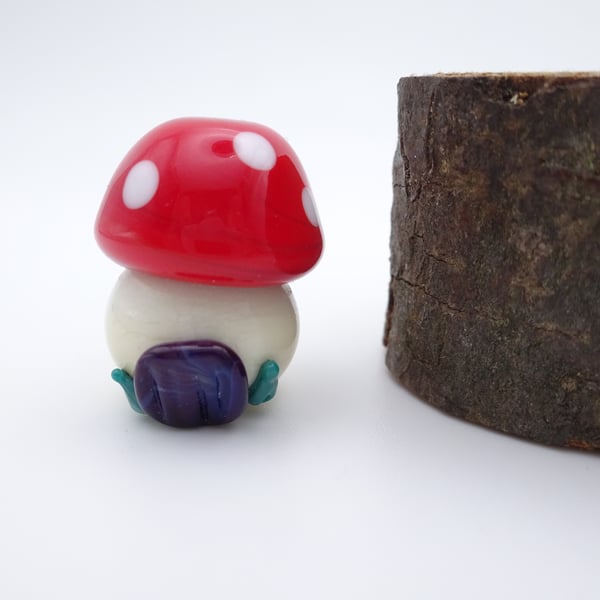 small glass toadstool house
