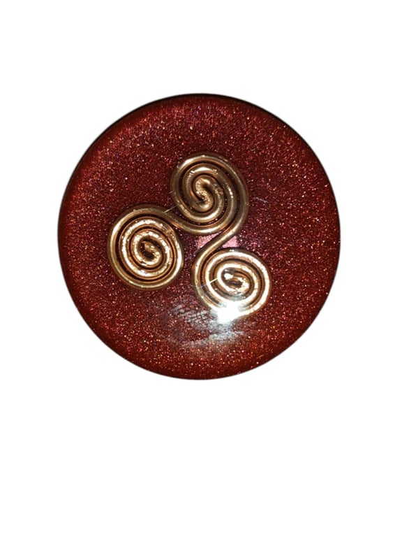 Triskelion in Metallic Dragon Blood . Frequency imprinted. SIZE SMALL 3.7CM diam