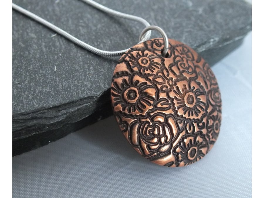 Floral design copper pendant