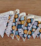 Handmade mini bunting with a clock and writing theme.