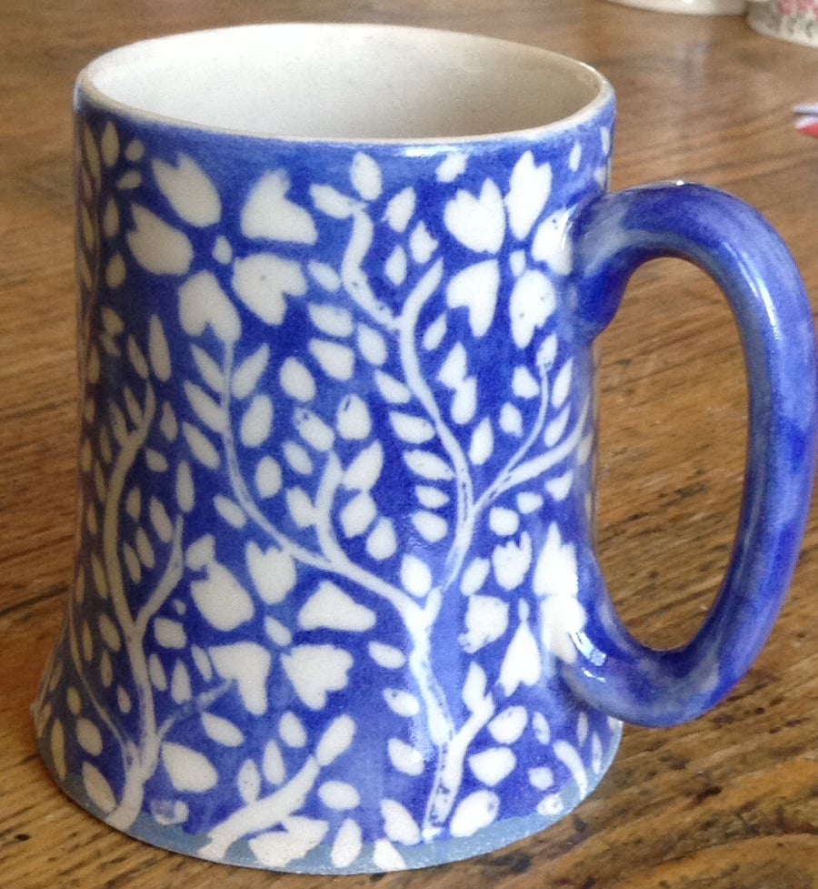 Mug with blue and white floral decoration. Free uk postage