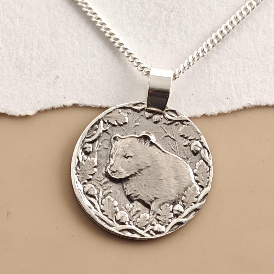 Image of Badger Engraved Sterling Silver Coin Necklace