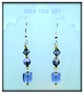 Purple glass drop earrings on Silver plated hooks. - Image 1