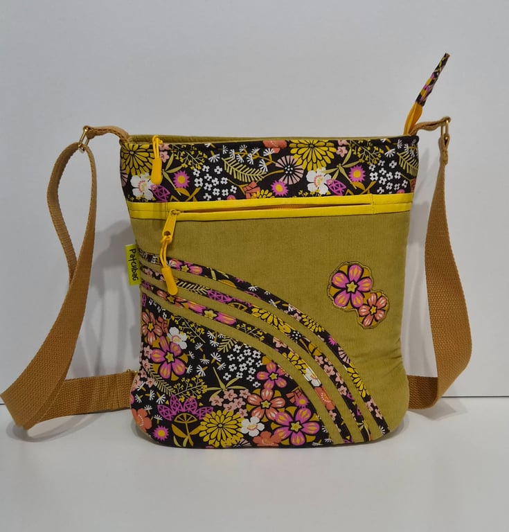 Mustard yellow corduroy handbag with pink and yellow flowers and dragonflies 