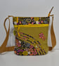 Mustard yellow corduroy handbag with pink and yellow flowers and dragonflies 