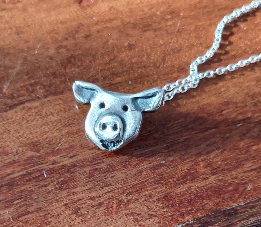 Silver piggy pendant