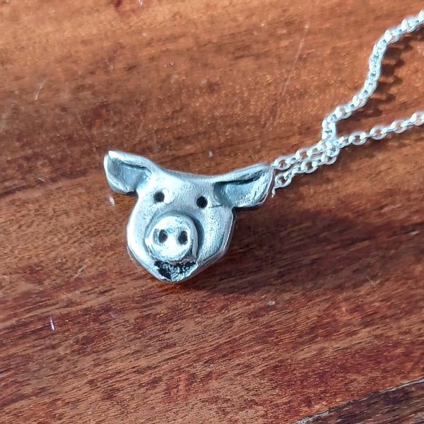 Silver piggy pendant