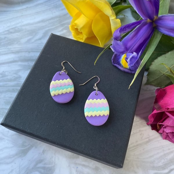 Easter egg patterned polymer clay earrings on sterling silver ear wires.