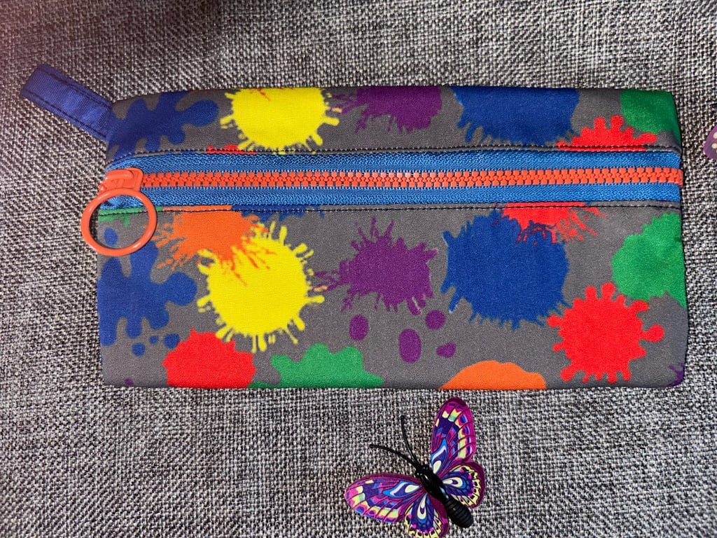 Pencil Case. Splat paint mark style with Orange Zipper