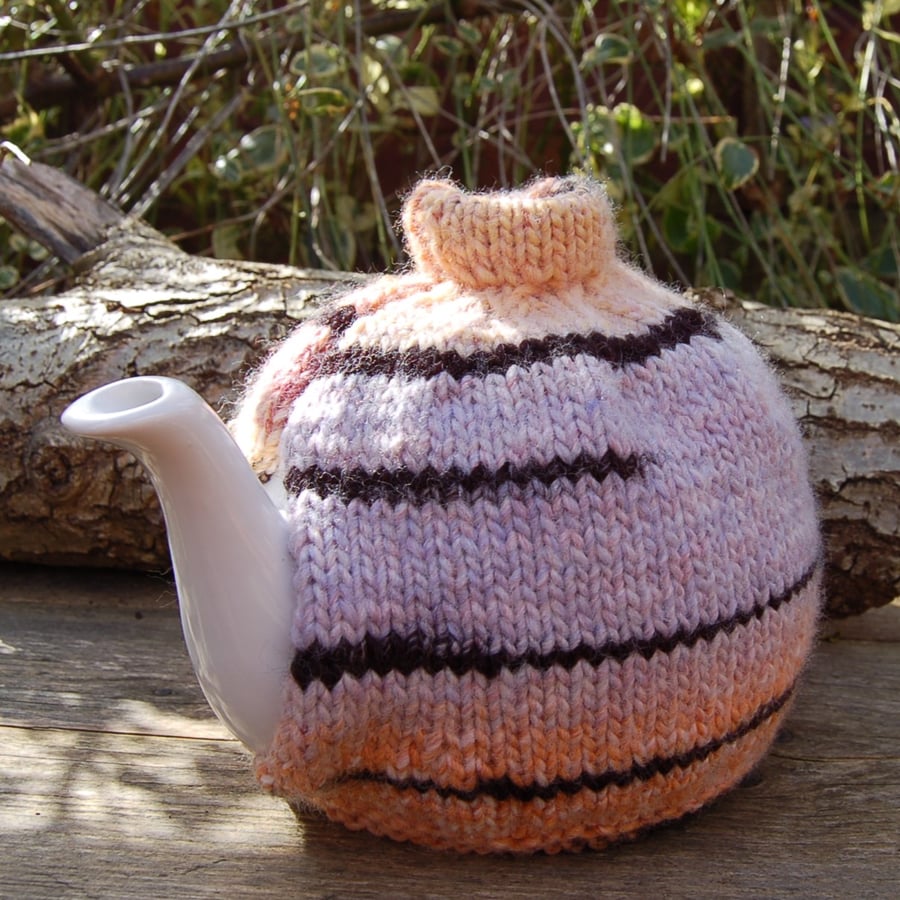 Tea cosy hand knitted using King Cole Safari yarn.  For a large teapot