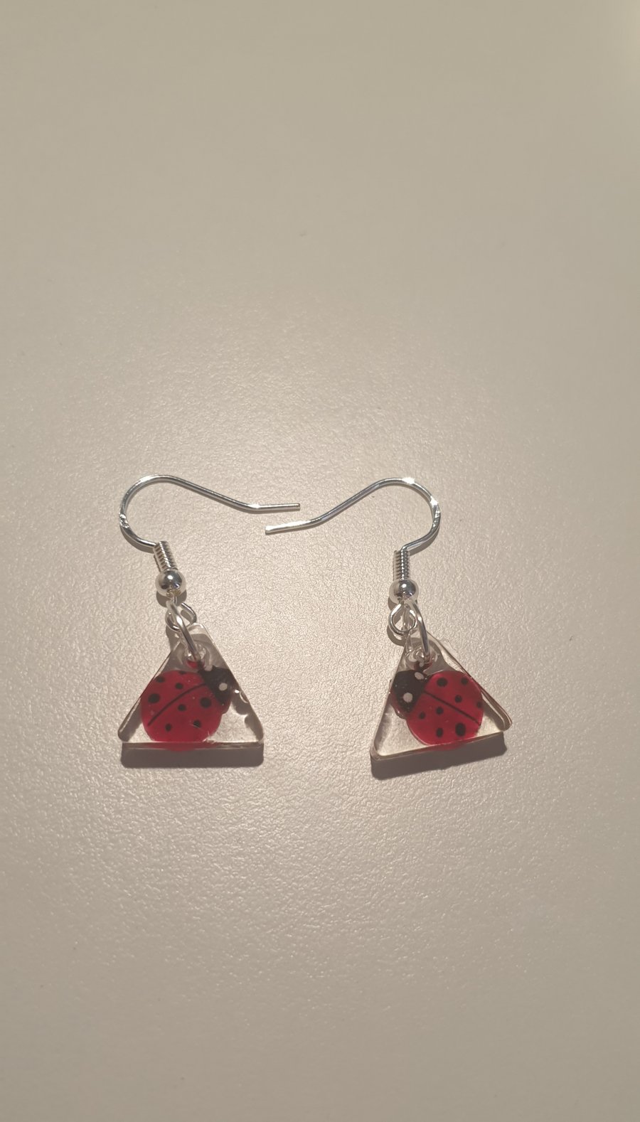Triangle ladybird resin earrings