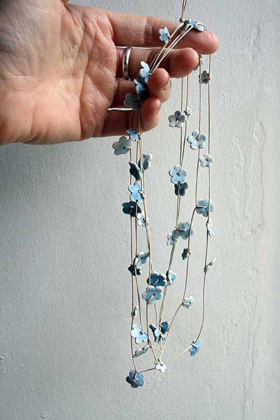 Forget-me-not blossom garland necklace-porcelain flowers with pale blue glaze