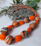 Handmade necklace in orange, black and white polymer clay - Image 2