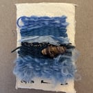 Beaded miniature weaving on card 4 of 10