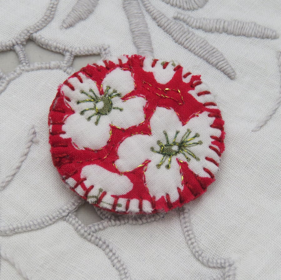 Brooch - white flowers on red with gold thread