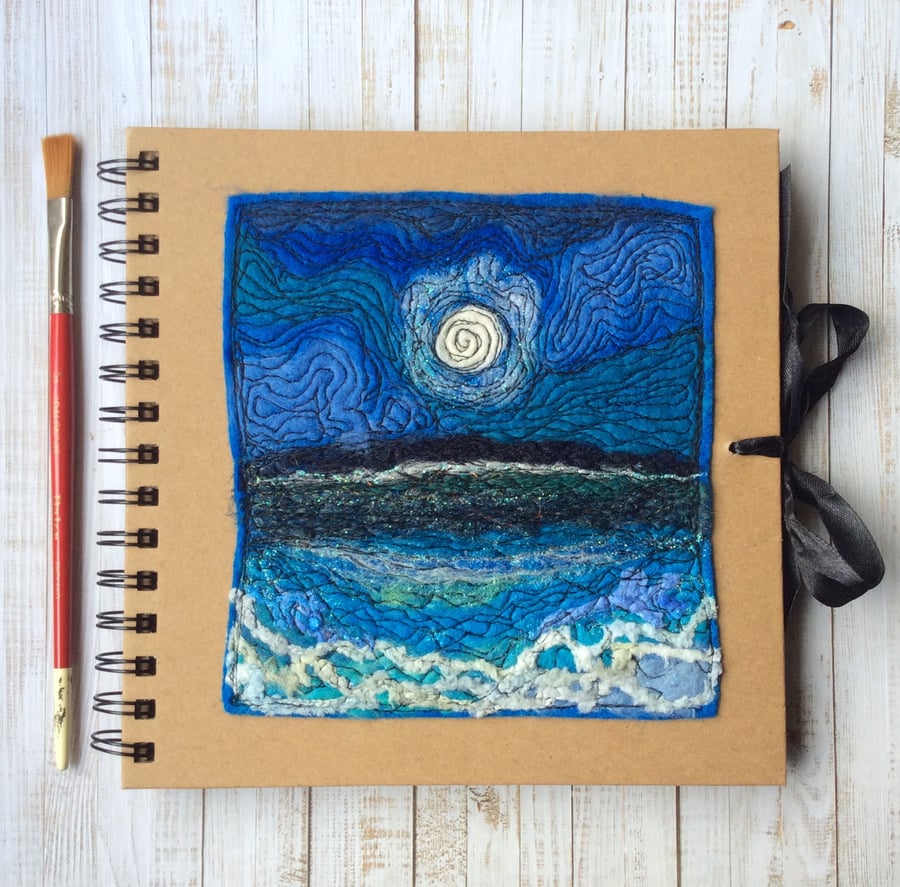 Square embroidered seascape journal or sketchbook. 